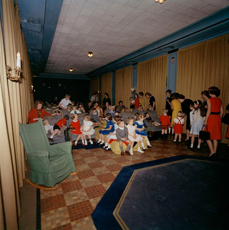 Young children gather in the Family Theater of the White House, during a joint birthday party for Caroline Kennedy and John F. Kennedy, Jr. (November 27, 1962, John F. Kennedy Presidential Library)